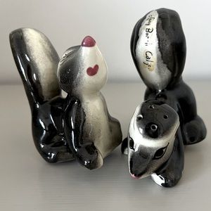 Vintage pair of salt and pepper shaker skunks from Long Beach California
